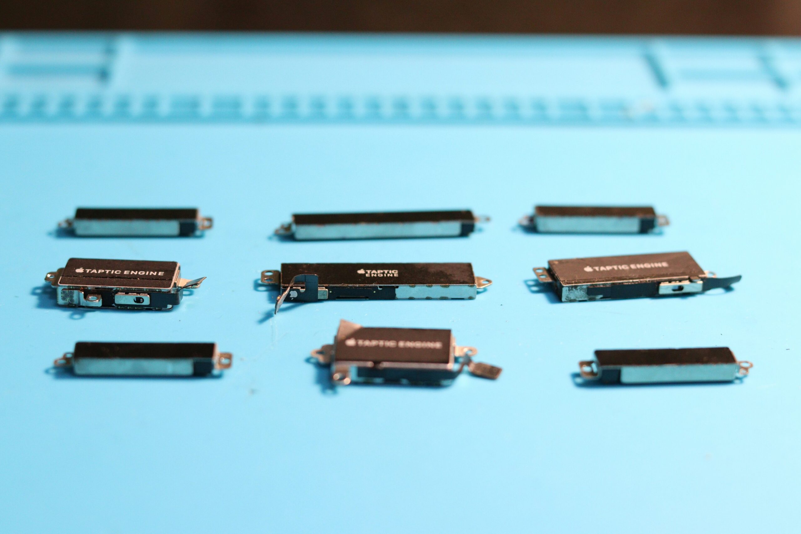 Close-up of various nail clipper designs showing curves, straight edges, and ergonomic handles.