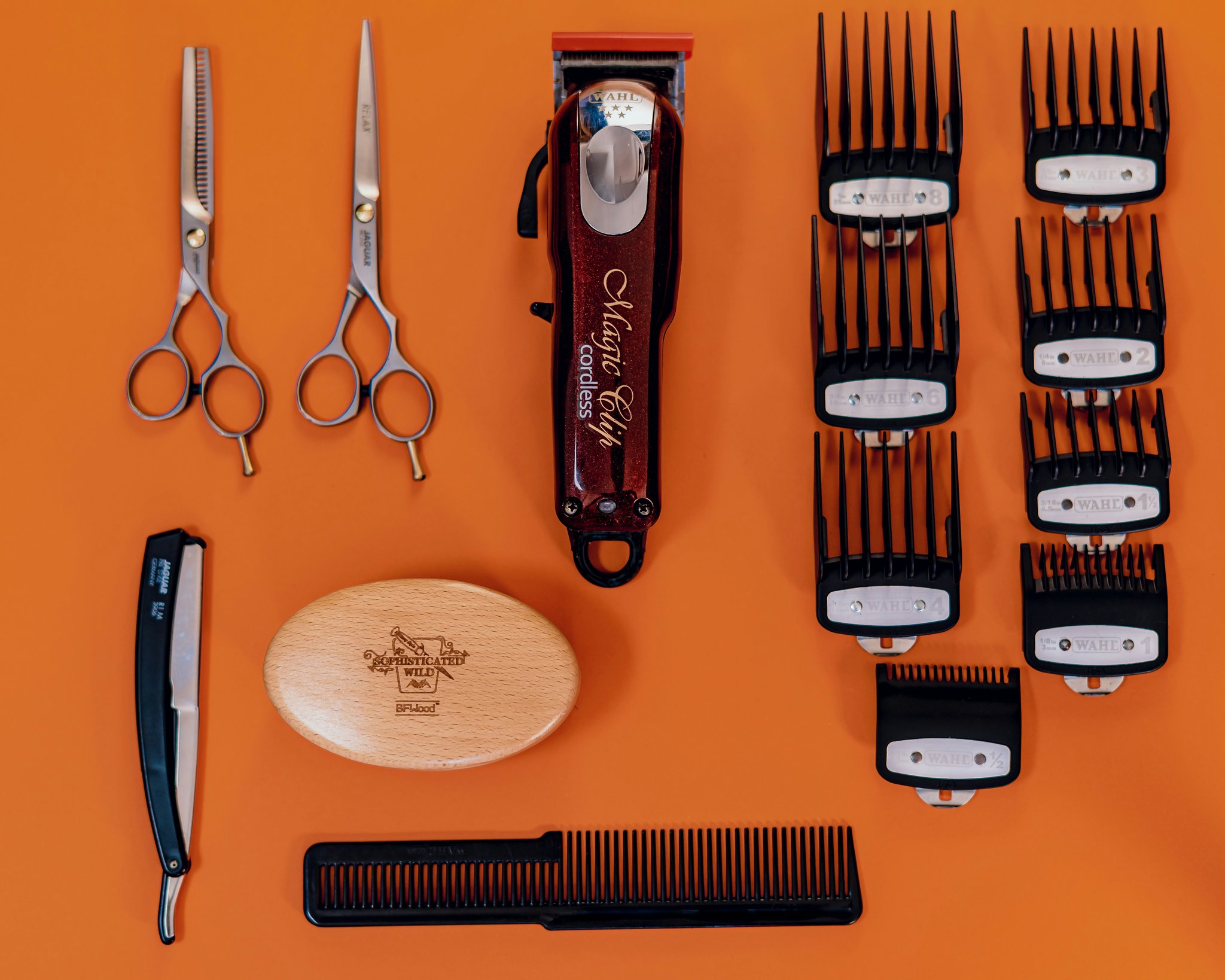 Image showing close-up of hands holding safety clippers with perfectly manicured nails