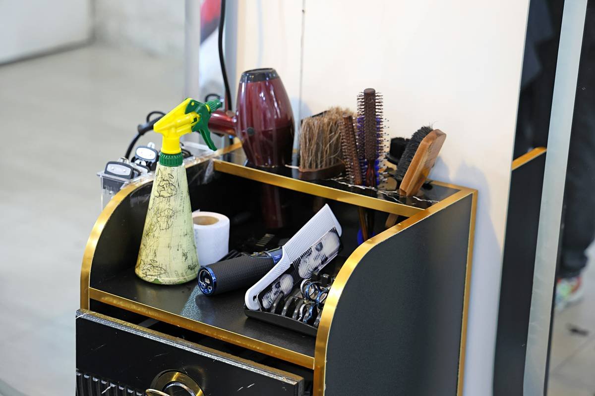 Side-by-side comparison: curved jaw manicure clippers vs. flat-blade toenail clippers