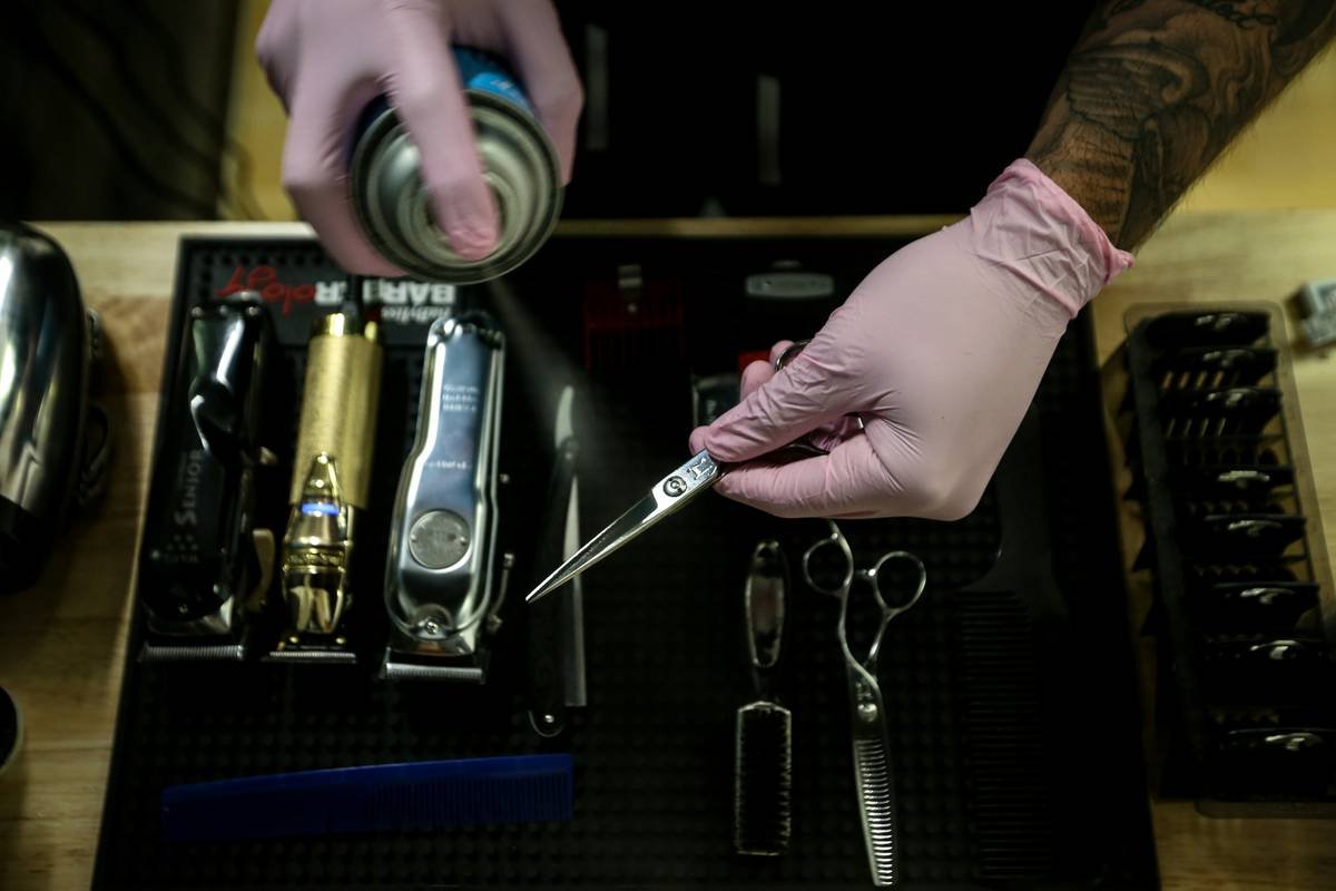 Milwaukee, WI. Businesses trying to getting around post quarantine, offering their services following all the safety measures for customers. Flashy Faded Barbershop was locked for two months.