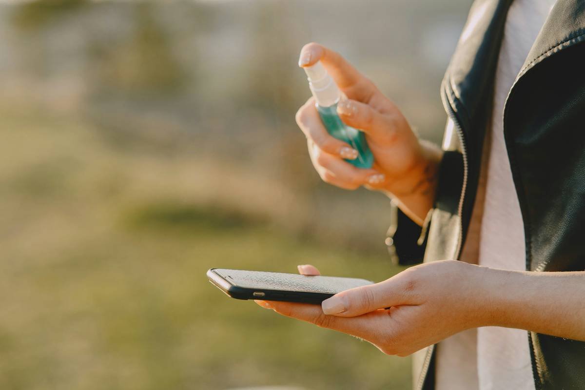person holding black tablet computer